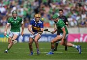 21 May 2023; Conor Stakelum of Tipperary in action against William O'Donoghue, left, and Gearóid Hegarty of Limerick during the Munster GAA Hurling Senior Championship Round 4 match between Tipperary and Limerick at FBD Semple Stadium in Thurles, Tipperary. Photo by Piaras Ó Mídheach/Sportsfile