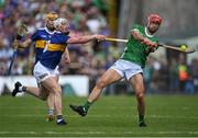 21 May 2023; Barry Nash of Limerick shoots under pressure from Eoghan Connolly of Tipperary during the Munster GAA Hurling Senior Championship Round 4 match between Tipperary and Limerick at FBD Semple Stadium in Thurles, Tipperary. Photo by Piaras Ó Mídheach/Sportsfile