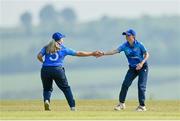 21 May 2023; Typhoons players Freya Sargent, left, and Alice Walsh during the Evoke Super Series match between Dragons and Typhoons at Oak Hill Cricket Club in Kilbride, Wicklow. Photo by Seb Daly/Sportsfile