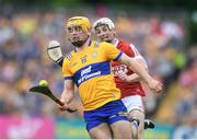 21 May 2023; Mark Rodgers of Clare in action against Tommy O'Connell of Cork during the Munster GAA Hurling Senior Championship Round 4 match between Clare and Cork at Cusack Park in Ennis, Clare. Photo by John Sheridan/Sportsfile