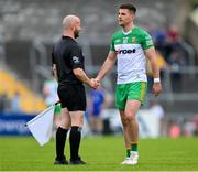 20 May 2023; Daire Ó Baoill of Donegal shakes hands with linesman Brendan Crawley before the GAA Football All-Ireland Senior Championship Round 1 match between Clare and Donegal at Cusack Park in Ennis, Clare. Photo by Ray McManus/Sportsfile