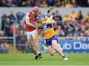 21 May 2023; Shane O'Donnell of Clare in action against Ciaran Joyce of Cork during the Munster GAA Hurling Senior Championship Round 4 match between Clare and Cork at Cusack Park in Ennis, Clare. Photo by John Sheridan/Sportsfile