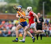 21 May 2023; Diarmuid Ryan of Clare is tackled by Patrick Horgan of Cork during the Munster GAA Hurling Senior Championship Round 4 match between Clare and Cork at Cusack Park in Ennis, Clare. Photo by Ray McManus/Sportsfile