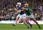 21 May 2023; Seamus Kennedy of Tipperary is tackled by Cathal O'Neill of Limerick during the Munster GAA Hurling Senior Championship Round 4 match between Tipperary and Limerick at FBD Semple Stadium in Thurles, Tipperary. Photo by Brendan Moran/Sportsfile