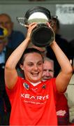 21 May 2023; The Cork captain Rachel Harty celebrate with the cup after the Munster Intermediate Camogie Final match between Cork and Kerry at Cusack Park in Ennis, Clare. Photo by Ray McManus/Sportsfile