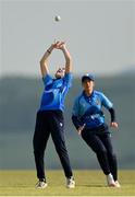 21 May 2023; Georgina Dempsey of Typhoons catches out Dragons batter Alana Dalzell during the Evoke Super Series match between Dragons and Typhoons at Oak Hill Cricket Club in Kilbride, Wicklow. Photo by Seb Daly/Sportsfile