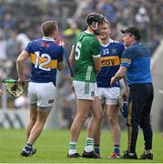 21 May 2023; Diarmaid Byrnes of Limerick shakes hands with John McGrath of Tipperary after the final whistle of the Munster GAA Hurling Senior Championship Round 4 match between Tipperary and Limerick at FBD Semple Stadium in Thurles, Tipperary. Photo by Brendan Moran/Sportsfile