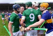 21 May 2023; Players, including Noel McGrath of Tipperary tussle after the Munster GAA Hurling Senior Championship Round 4 match between Tipperary and Limerick at FBD Semple Stadium in Thurles, Tipperary. Photo by Piaras Ó Mídheach/Sportsfile
