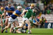 21 May 2023; Graeme Mulcahy of Limerick gets away from Tipperary players Dan McCormack, Johnny Ryan, Brian McGrath and Jake Morris during the Munster GAA Hurling Senior Championship Round 4 match between Tipperary and Limerick at FBD Semple Stadium in Thurles, Tipperary. Photo by Brendan Moran/Sportsfile