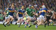 21 May 2023; David Reidy of Limerick in action against Tipperary players, from left, Seamus Callanan, Jake Morris and Bryan O'Mara during the Munster GAA Hurling Senior Championship Round 4 match between Tipperary and Limerick at FBD Semple Stadium in Thurles, Tipperary. Photo by Brendan Moran/Sportsfile