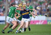 21 May 2023; Jake Morris of Tipperary is tackled by Darragh O'Donovan of Limerick, left, during the Munster GAA Hurling Senior Championship Round 4 match between Tipperary and Limerick at FBD Semple Stadium in Thurles, Tipperary. Photo by Piaras Ó Mídheach/Sportsfile