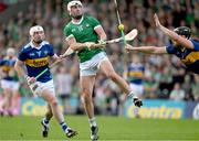 21 May 2023; Aaron Gillane of Limerick has a shot blocked by Dan McCormack of Tipperary during the Munster GAA Hurling Senior Championship Round 4 match between Tipperary and Limerick at FBD Semple Stadium in Thurles, Tipperary. Photo by Brendan Moran/Sportsfile