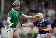 21 May 2023; Graeme Mulcahy of Limerick is tackled by Bryan O'Mara of Tipperary during the Munster GAA Hurling Senior Championship Round 4 match between Tipperary and Limerick at FBD Semple Stadium in Thurles, Tipperary. Photo by Brendan Moran/Sportsfile