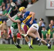 21 May 2023; Cathal Barrett of Tipperary is tackled by Tom Morrissey of Limerick during the Munster GAA Hurling Senior Championship Round 4 match between Tipperary and Limerick at FBD Semple Stadium in Thurles, Tipperary. Photo by Brendan Moran/Sportsfile