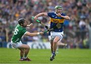 21 May 2023; Noel McGrath of Tipperary is tackled by Johnny Ryan of Tipperary during the Munster GAA Hurling Senior Championship Round 4 match between Tipperary and Limerick at FBD Semple Stadium in Thurles, Tipperary. Photo by Brendan Moran/Sportsfile