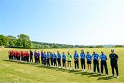 21 May 2023; Players and officials observe a minutes silence for National Famine Commemoration Day before the Evoke Super Series match between Dragons and Typhoons at Oak Hill Cricket Club in Kilbride, Wicklow. Photo by Seb Daly/Sportsfile