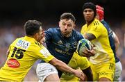 20 May 2023; Hugo Keenan of Leinster is tackled by Brice Dulin of La Rochelle during the Heineken Champions Cup Final match between Leinster and La Rochelle at Aviva Stadium in Dublin. Photo by Ramsey Cardy/Sportsfile