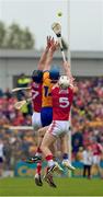 21 May 2023; Shane O'Donnell of Clare and Cork players Robert Downey and Tommy O'Connell of Cork contest a dropping sliotar during the Munster GAA Hurling Senior Championship Round 4 match between Clare and Cork at Cusack Park in Ennis, Clare. Photo by Ray McManus/Sportsfile