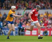 21 May 2023; Darragh Fitzgibbon of Cork is tackled by Ryan Taylor of Clare during the Munster GAA Hurling Senior Championship Round 4 match between Clare and Cork at Cusack Park in Ennis, Clare. Photo by Ray McManus/Sportsfile