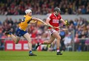 21 May 2023; Darragh Fitzgibbon of Cork is tackled by Ryan Taylor of Clare during the Munster GAA Hurling Senior Championship Round 4 match between Clare and Cork at Cusack Park in Ennis, Clare. Photo by Ray McManus/Sportsfile