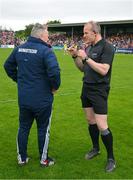 21 May 2023; Referee Johnny Murphy and Cork manager Pat Ryan in conversation the Munster GAA Hurling Senior Championship Round 4 match between Clare and Cork at Cusack Park in Ennis, Clare. Photo by Ray McManus/Sportsfile