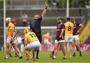 21 May 2023; Referee Michael Kennedy shows a yellow card to Evan Niland of Galway during the Leinster GAA Hurling Senior Championship Round 4 match between Galway and Antrim at Pearse Stadium in Galway. Photo by Tom Beary/Sportsfile