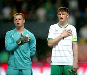 23 May 2023; Republic of Ireland players Jason Healy, left, and Freddie Turley during the national anthem before the UEFA European U17 Championship Final Tournament match between Hungary and Republic of Ireland at Pancho Aréna in Felcsút, Hungary. Photo by David Balogh/Sportsfile