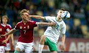 23 May 2023; Mason Melia of Republic of Ireland in action against Zétény Varga of Hungary during the UEFA European U17 Championship Final Tournament match between Hungary and Republic of Ireland at Pancho Aréna in Felcsút, Hungary. Photo by David Balogh/Sportsfile