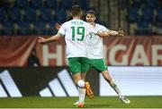 23 May 2023; Mason Melia of Republic of Ireland celebrates after scoring his side's third goal with teammate Luke Kehir during the UEFA European U17 Championship Final Tournament match between Hungary and Republic of Ireland at Pancho Aréna in Felcsút, Hungary. Photo by David Balogh/Sportsfile