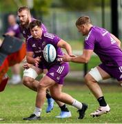 24 May 2023; Josh Wycherley makes a pass to Gavin Coombes during a Munster Rugby squad training session at Hamilton RFC in Cape Town, South Africa. Photo by Sportsfile