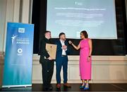 25 May 2023; James, left, and Christopher Magee, grandsons of Jimmy Magee, are interviewed by MC Gráinne McElwain during the Federation of Irish Sport 2023 Irish Sport Industry Awards, in association with Financial Broker, at The Westin Hotel in Dublin. Photo by Brendan Moran/Sportsfile