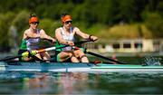 26 May 2023; Imogen Magner, right, and Natalie Long of Ireland compete in the Women's Pair Repechage during day 2 of the European Rowing Championships 2023 at Bled in Slovenia. Photo by Vid Ponikvar/Sportsfile