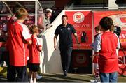 26 May 2023; St Patrick's Athletic mascots watch on as St Patrick's Athletic manager Jon Daly walk out of the tunnel before the SSE Airtricity Men's Premier Division match between St Patrick's Athletic and Dundalk at Richmond Park in Dublin. Photo by Tyler Miller/Sportsfile