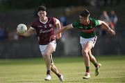 26 May 2023; Shay McGlinchey of Galway in action against Shane Cunningham of Mayo during the 2023 Electric Ireland Connacht GAA Football Minor Championship Final between Galway and Mayo at Tuam Stadium in Galway. Photo by Ray Ryan/Sportsfile