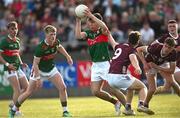 26 May 2023; Jamie Clarke of Mayo in action against Olan Kelly of Galway during the 2023 Electric Ireland Connacht GAA Football Minor Championship Final between Galway and Mayo at Tuam Stadium in Galway. Photo by Ray Ryan/Sportsfile