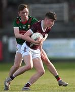 26 May 2023; Brian O'Malley of Galway in action against Senan Guilfoyle of Mayo during the 2023 Electric Ireland Connacht GAA Football Minor Championship Final between Galway and Mayo at Tuam Stadium in Galway. Photo by Ray Ryan/Sportsfile
