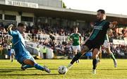 26 May 2023; Richie Towell of Shamrock Rovers in action against Cork City goalkeeper Jimmy Corcoran during the SSE Airtricity Men's Premier Division match between Cork City and Shamrock Rovers at Turner's Cross in Cork. Photo by Eóin Noonan/Sportsfile