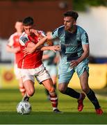 26 May 2023; Archie Davies of Dundalk in action against Adam Murphy of St Patrick's Athletic during the SSE Airtricity Men's Premier Division match between St Patrick's Athletic and Dundalk at Richmond Park in Dublin. Photo by Tyler Miller/Sportsfile