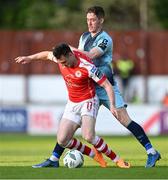 26 May 2023; Jason McClelland of St Patrick's Athletic is tackled by John Martin of Dundalk during the SSE Airtricity Men's Premier Division match between St Patrick's Athletic and Dundalk at Richmond Park in Dublin. Photo by Tyler Miller/Sportsfile