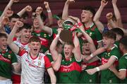 26 May 2023; Mayo captain Rio Mortimer lifts the cup alongside his teammates after the 2023 Electric Ireland Connacht GAA Football Minor Championship Final between Galway and Mayo at Tuam Stadium in Galway. Photo by Ray Ryan/Sportsfile