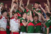 26 May 2023; Mayo captain Rio Mortimer lifts the cup alongside his teammates after the 2023 Electric Ireland Connacht GAA Football Minor Championship Final between Galway and Mayo at Tuam Stadium in Galway. Photo by Ray Ryan/Sportsfile
