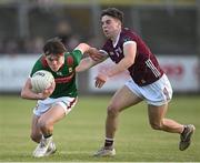 26 May 2023; Dara Neary of Mayo in action against Olan Kelly of Galway during the 2023 Electric Ireland Connacht GAA Football Minor Championship Final between Galway and Mayo at Tuam Stadium in Galway. Photo by Ray Ryan/Sportsfile