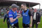 26 May 2023; Mayo manager Sean Deane, left, shakes hands with Galway manager Alan Glynn after the 2023 Electric Ireland Connacht GAA Football Minor Championship Final between Galway and Mayo at Tuam Stadium in Galway. Photo by Ray Ryan/Sportsfile