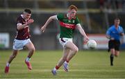 26 May 2023; Darragh Beirne of Mayo in action against Ciaran McDonagh of Galway during the 2023 Electric Ireland Connacht GAA Football Minor Championship Final between Galway and Mayo at Tuam Stadium in Galway. Photo by Ray Ryan/Sportsfile