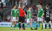 26 May 2023; Johnny Kenny of Shamrock Rovers is shown a red card by referee Sean Grant during the SSE Airtricity Men's Premier Division match between Cork City and Shamrock Rovers at Turner's Cross in Cork. Photo by Eóin Noonan/Sportsfile