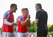 26 May 2023; Jamie Lennon, left, and Eoin Doyle of St Patrick's Athletic protest to referee Ray Matthews, after Jake Mulraney of St Patrick's Athletic, not pictured, was shown a red card during the SSE Airtricity Men's Premier Division match between St Patrick's Athletic and Dundalk at Richmond Park in Dublin. Photo by Tyler Miller/Sportsfile