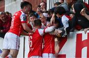 26 May 2023; Conor Carty of St Patrick's Athletic, right, celebrates with teammates Jamie Lennon, centre, and Jason McClelland after scoring his side's second goal during the SSE Airtricity Men's Premier Division match between St Patrick's Athletic and Dundalk at Richmond Park in Dublin. Photo by Tyler Miller/Sportsfile