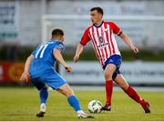 26 May 2023; Marc Ludden of Treaty United in action against Seamus Keogh of Finn Harps during the SSE Airtricity Men's First Division match between Treaty United and Finn Harps at Markets Field in Limerick. Photo by Michael P Ryan/Sportsfile