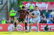 26 May 2023; Declan McDaid of Bohemians in action against John Ross Wilson of Shelbourne during the SSE Airtricity Men's Premier Division match between Bohemians and Shelbourne at Dalymount Park in Dublin. Photo by Seb Daly/Sportsfile