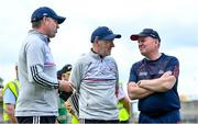27 May 2023; Cork manager John Cleary, right, in conversation with Louth manager Mickey Harte, centre, and selector Gavin Devlin before the GAA Football All-Ireland Senior Championship Round 1 match between Louth and Cork at Páirc Tailteann in Navan, Meath. Photo by Seb Daly/Sportsfile